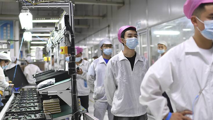Confinements et dépistages obligatoires pèsent sur la productivité de l'usine du monde. (archive)