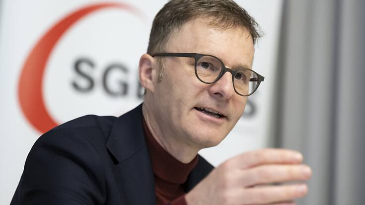 Daniel Lampart, premier secrétaire de l'USS, a exigé des garanties pour le personnel mardi, après le rachat de CS par UBS.