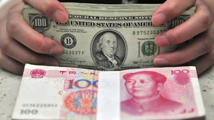 Le yuan onshore perd depuis le début de l'année du terrain face au dollar US et a atteint vendredi à 7,3503 yuans pour un dollar son cours le plus bas depuis décembre 2007. (archives)