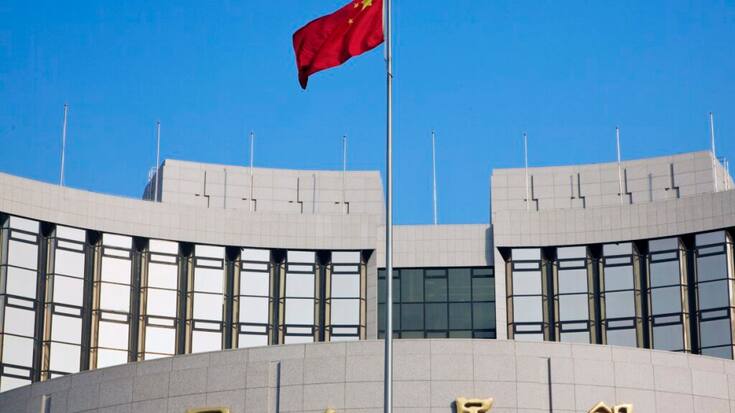 La banque centrale chinoise abaisse deux taux d'intérêt clés à des niveaux historiquement bas.