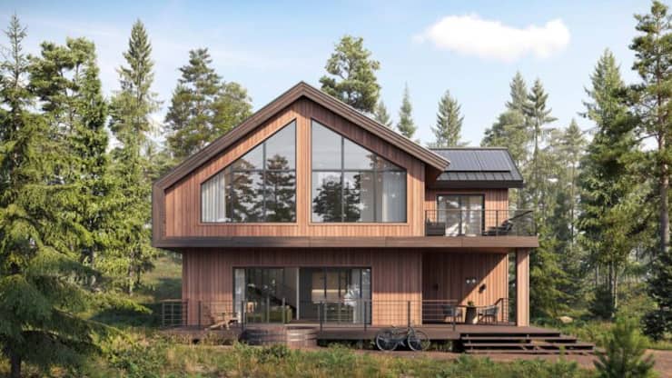 3d rendering of wooden forest house surrounded by trees. Digitally generated image of a luxurious forest bungalow with large windows during day.