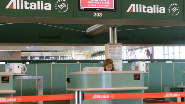 Un check-in à l'aéroport de Milan Malpensa, désormais baptisé Aéroport international de Milan Malpensa- Silvio Berlusconi.