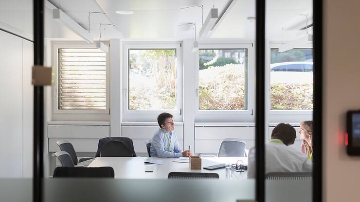 Employés dans un bureau de l'agence de recrutement Adecco à Zurich (archives).