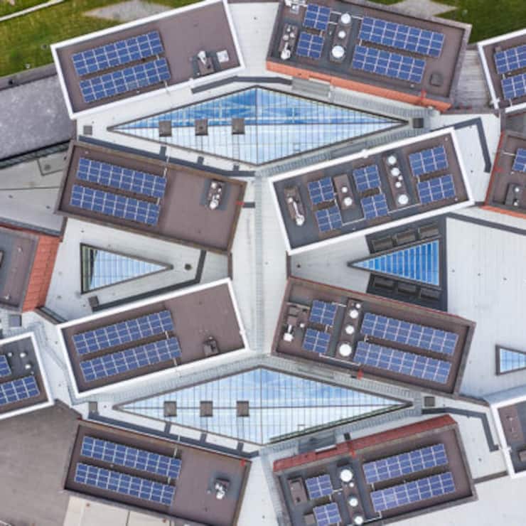 Espoo, Finland - September 11, 2020: Aerial view of the brand new Aalto university campus. Modern nordic architecture. The solar panels mounted on the roof.