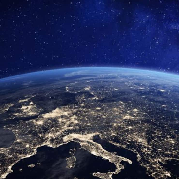 Europe at night viewed from space with city lights showing human activity in Germany, France, Spain, Italy and other countries, 3d rendering of planet Earth, elements from NASA
