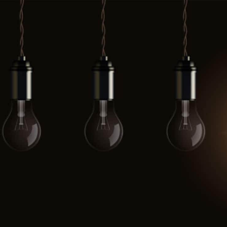 Light bulbs hang from ceiling vector illustration. Realistic 3d glass electric lamps with one bright lightbulb glowing, symbol of creative innovation, energy of inspiration on dark background