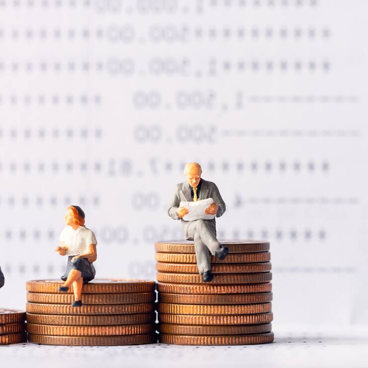 Miniature people: Elderly people sitting on coins stack. Retirement planning. money saving and Investment. Time counting down for retirement and pension.