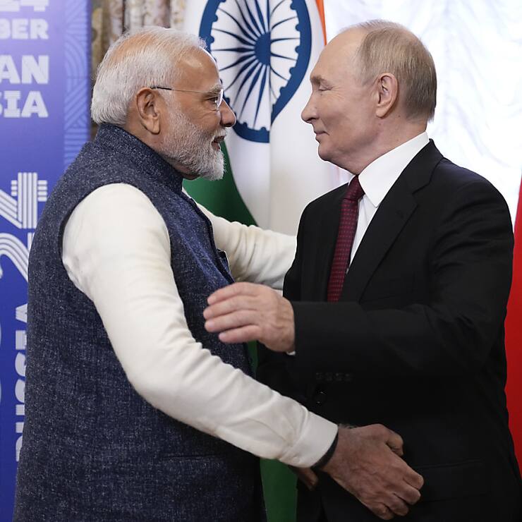 Une vingtaine de dirigeants, dont ici le Premier ministre indien Narendra Modi, ont rencontré le président russe Vladimir Poutine.