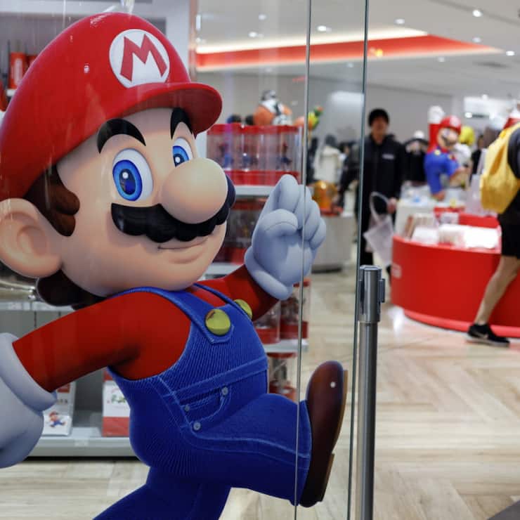 Le géant nippon des jeux vidéos espère que les fonctionnalités supplémentaires de sa console revisitée feront oublier un prix considéré élevé. (archive)