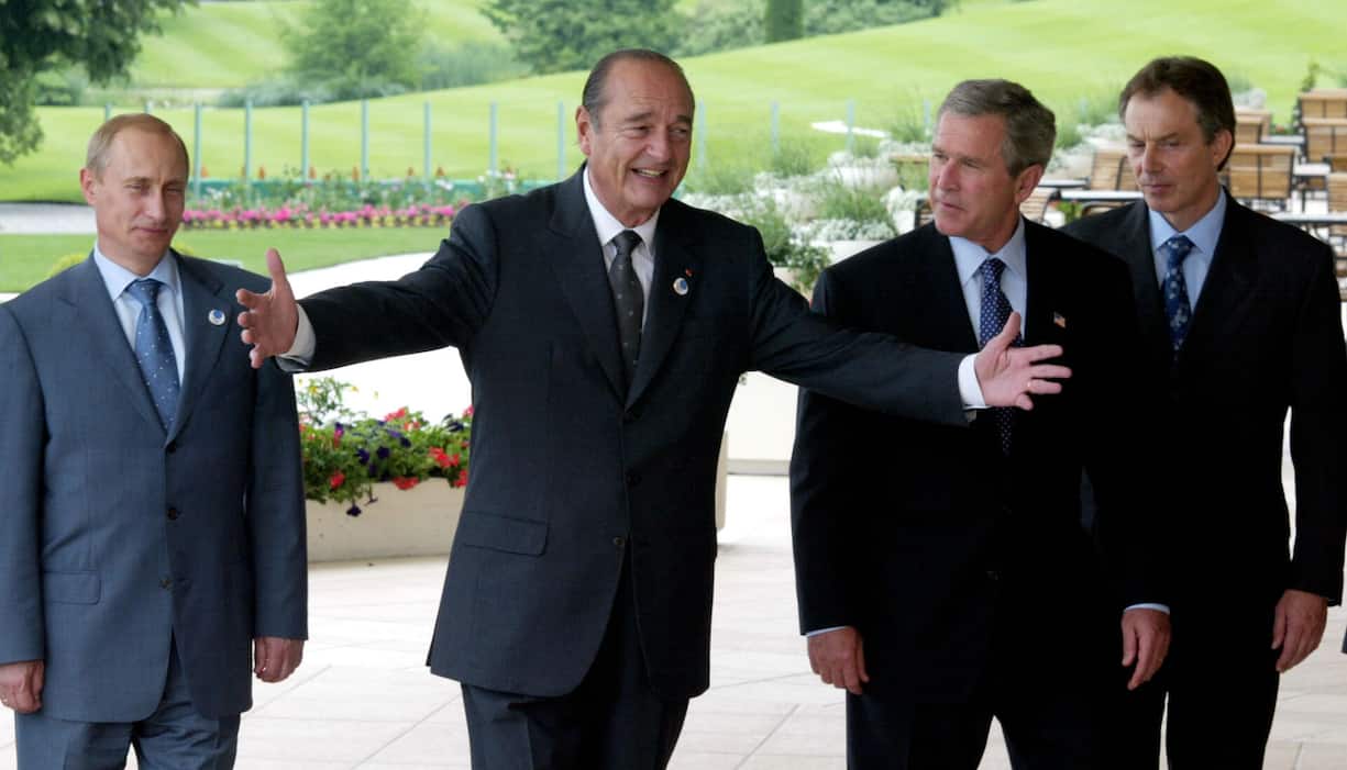 Vladimir Poutine, Jacques Chirac, George W. Bush et Tony Blair, lors du G8 à Evian en 2003.