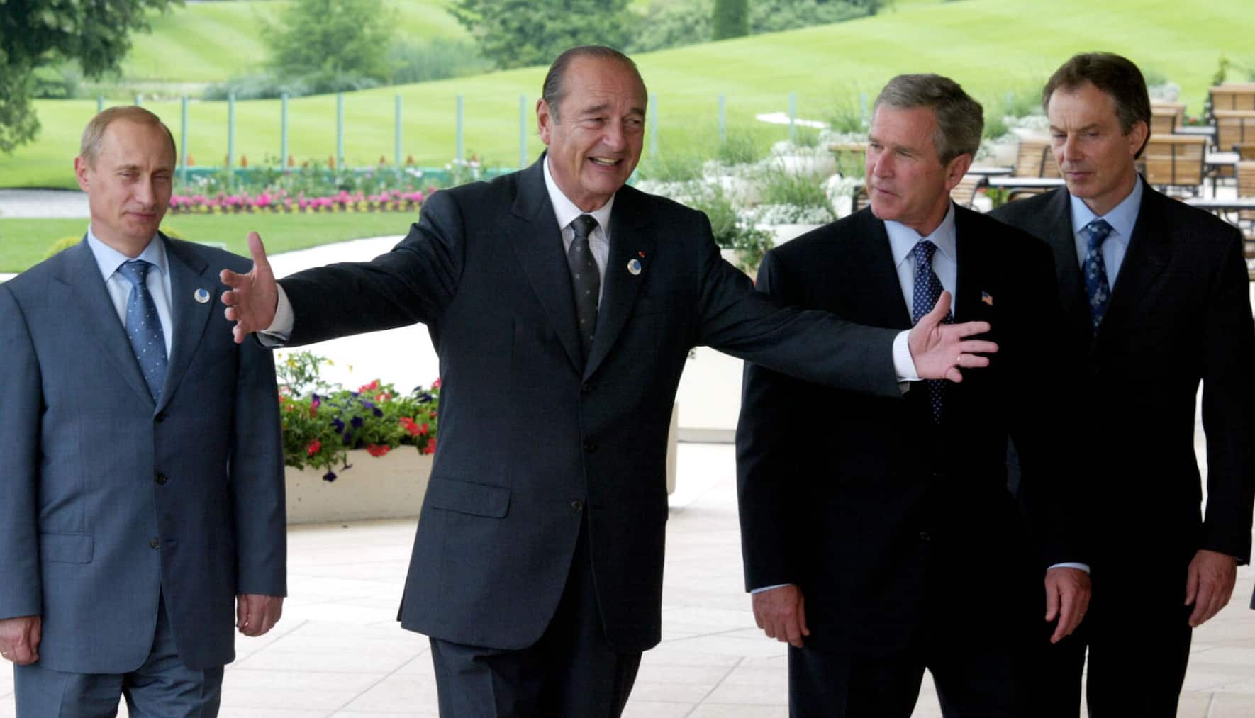 Vladimir Poutine, Jacques Chirac, George W. Bush et Tony Blair, lors du G8 à Evian en 2003.